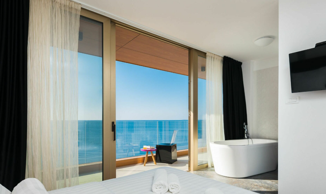 Een slaapkamer in Villa Gloss