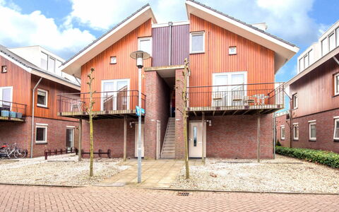 Assum: Wolk, Lucht, Venster, Hout, Gebouw, Land Lot, Steen, Stedelijk Ontwerp, Buurt, Woongebied