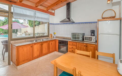 Sa Rossa: Cabinetry, Countertop, Meubilair, Eigendom, Keuken, Toestel Van De Keuken, Hout, Gootsteen, Fornuis, Interieur Ontwerp