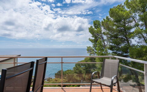 Orizzonte: Eigendom, Lucht, Onroerend Goed, Kust, Huis, Wolk, Boom, Vakantie, Balkon, Condominium