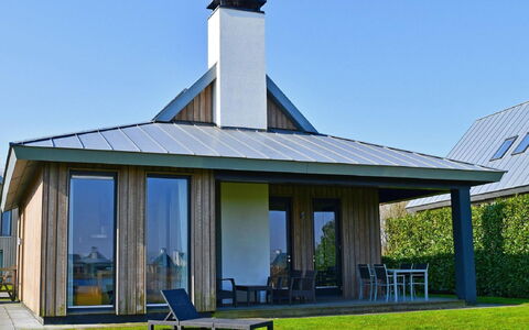 Oesterdam Resort: Meubilair, Tafel, Gebouw, Stoel, Tableware, Wolk, Lucht, Tafelkleed, Buitenmeubels, Schaduw