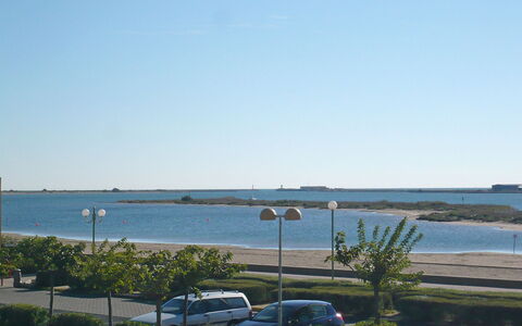 Maisons sur la Plage: Water, Fabriek, Lucht, Auto, Voertuig, Azure, Straatlantaarn, Land Lot, Kust En Oceanic Landvormen, Horizon