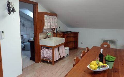 L'attico Di Castelfidardo: Tafel, Cabinetry, Meubilair, Gebouw, Voedsel, Tableware, Lade, Hout, Ladenkast, Interieur Ontwerp