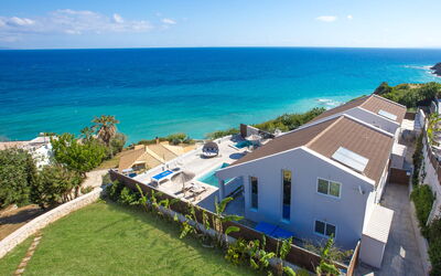 Bouka Villas: Water, Lucht, Fabriek, Wolk, Gebouw, Eigendom, Venster, Blauw, Azure, Huis