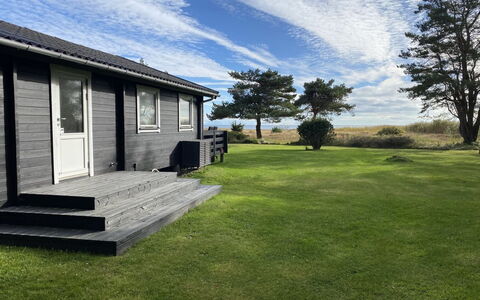 Lycka - 3Km from the Sea: Appartement, Schaduw, Balkon, Stoel, Hek, Buitenmeubels, Aluminium, Kunstgras