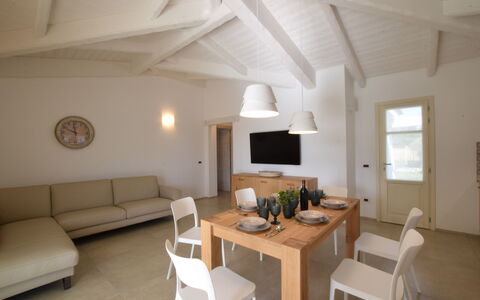 Villa Helios - Budoni, Sardegna: Meubilair, Eigendom, Tafel, Bankstel, Verlichting, Hout, Interieur Ontwerp, Venster, Woonkamer, Comfort