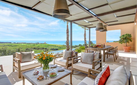 Villa Corallo - Sea Front | By Rocco Forte Villas: Tafel, Fabriek, Lucht, Meubilair, Eigendom, Bloempot, Stoel, Azure, Kamerplant, Schaduw