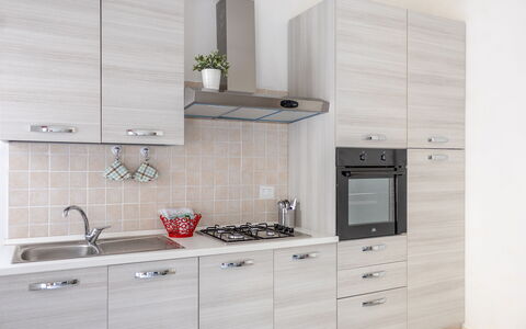 Maison Loreto: Cabinetry, Countertop, Eigendom, Meubilair, Gebouw, Kraan, Gootsteen, Wastafel, Toestel Van De Keuken, Keuken