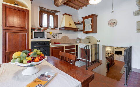 Chiara House In Galenda, Chianti, Pool And Nature: Tafel, Meubilair, Cabinetry, Eigendom, Countertop, Hout, Interieur Ontwerp, Stoel, Keuken, Tableware