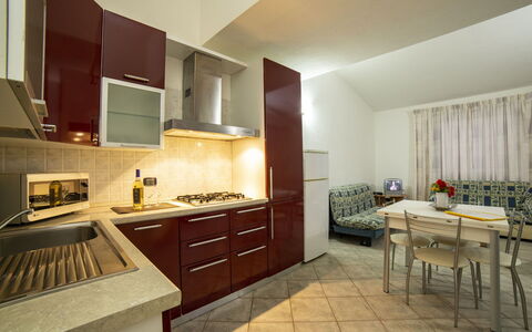 Villino Trilocale Apartments Seaside: Keuken, Toestel Van De Keuken, Flooring, Interieur Ontwerp, Major Appliance, Countertop, Hout, Verdieping, Meubilair, Plafond