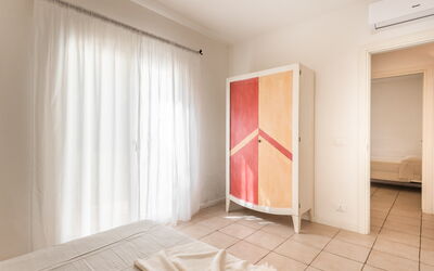 Appartamento Cormorano: Interieur Ontwerp, Verdieping, Meubilair, Flooring, Hout, Slaapkamer, Plafond, Textiel, Kamer, Bed