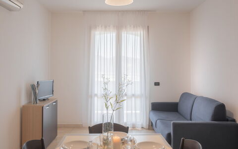 Le Fontane Apartments In Villasimius: Interieur Ontwerp, Meubilair, Flooring, Verdieping, Hout, Kamer, Plafond, Verlichting, Appartement, Woonkamer
