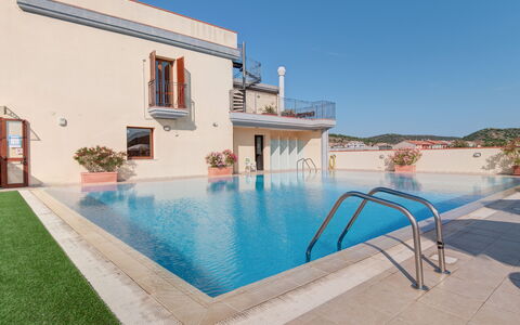 Le Fontane Apartments In Villasimius: Zwembad, Toevlucht, Hotel, Thermae, Badplaats, Recreatiecentrum, Villa, Eco Hotel, Kamerplant, Hacienda