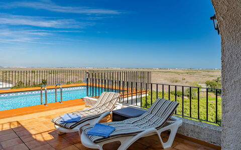 Los Delfines: Appartement, Meubilair, Woongebied, Balkon, Condominium, Stoel, Schaduw, Toevlucht, Kust, Hotel