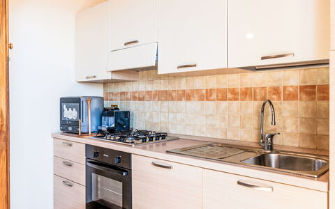 Casa del Mare: Keuken, Major Appliance, Hout, Toestel Van De Keuken, Countertop, Interieur Ontwerp, Flooring, Cabinetry, Verdieping, Huis