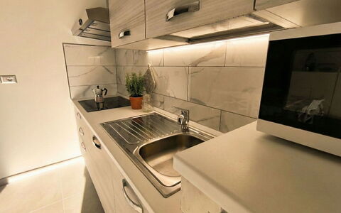 Posada 10: Countertop, Keuken, Toestel Van De Keuken, Flooring, Hout, Cabinetry, Interieur Ontwerp, Major Appliance, Huishoudapparatuur, Verdieping