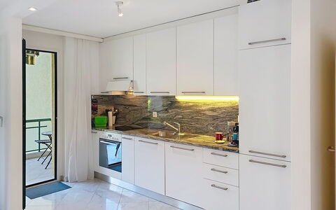Apt. Hermosa: Keuken, Countertop, Flooring, Toestel Van De Keuken, Interieur Ontwerp, Major Appliance, Hout, Verdieping, Meubilair, Cabinetry