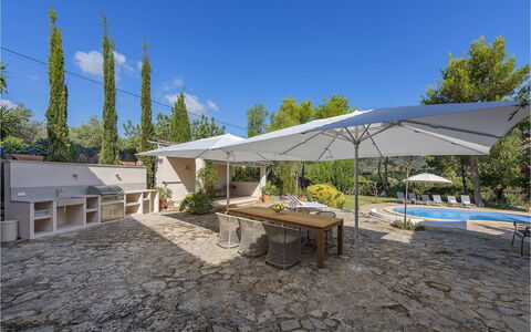 Can Cabana: Meubilair, Buitenmeubels, Stoel, Schaduw, Paraplu, Flagstone, Buitentafel, Tuin, Landscaping, Patio