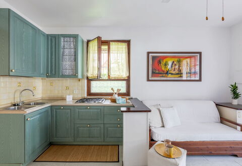 Veranda sul Conero: Meubilair, Interieur Ontwerp, Cabinetry, Flooring, Hout, Keuken, Countertop, Verdieping, Toestel Van De Keuken, Kamer