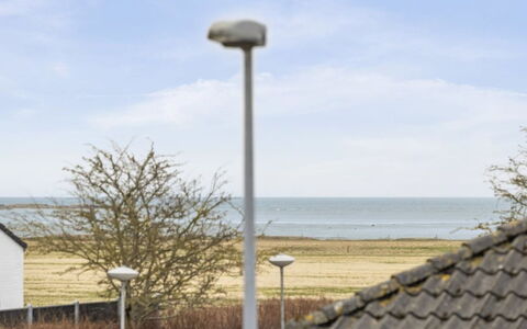 Seved - 440M from the Sea: Appartement, Schaduw, Balkon, Stoel, Hek, Buitenmeubels, Aluminium, Kunstgras