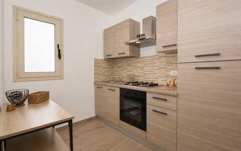 Villa Cosentini: Major Appliance, Hout, Keuken, Countertop, Toestel Van De Keuken, Interieur Ontwerp, Flooring, Cabinetry, Appartement, Verdieping