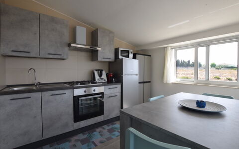 Villa Giugiola: Countertop, Keuken, Meubilair, Flooring, Verdieping, Interieur Ontwerp, Loodgieterswerkinrichting, Plafond, Major Appliance, Wastafel