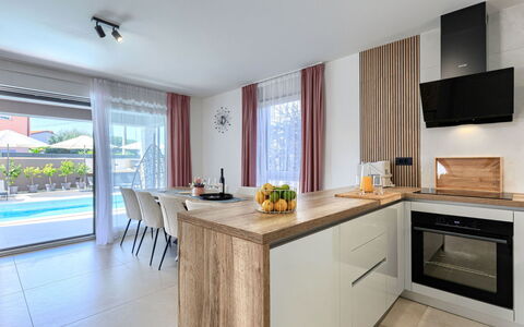 Laluma: Interieur Ontwerp, Flooring, Countertop, Hout, Meubilair, Verdieping, Keuken, Huis, Cabinetry, Verlichting
