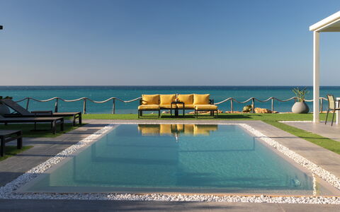 Villa Sabbie Rosse 6: Blauw, Water, Zwemwater, Buitenmeubels, Zee, Zwembad, Toevlucht, Oceaan, Kust En Oceanic Landvormen, Meubilair