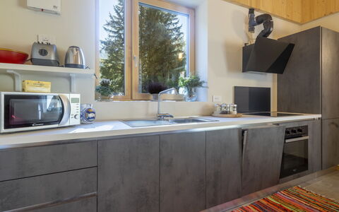 Crestun Design Duplex: Countertop, Keuken, Toestel Van De Keuken, Flooring, Meubilair, Major Appliance, Hout, Interieur Ontwerp, Cabinetry, Huishoudapparatuur