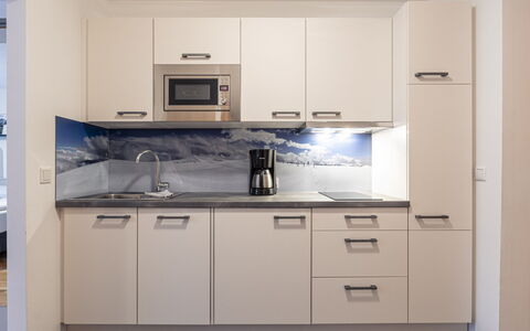 Sankt Georgen am Kreischberg 160: Cabinetry, Countertop, Eigendom, Gootsteen, Gebouw, Keuken, Toestel Van De Keuken, Hout, Fornuis, Huishoudapparatuur